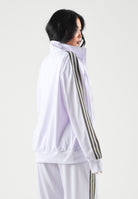 ADIDAS ORIGINALS Felpa con zip  FIREBIRD lilla da donna con 3-stripes iconiche e mini logo KU8195 . ADIDAS ORIGINALS 