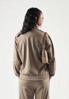 ADIDAS ORIGINALS Felpa con zip FIREBIRD TRACK TOP LOOSE Khaki power pink, marrone e rosa, da donna KU8196 . ADIDAS ORIGINALS 