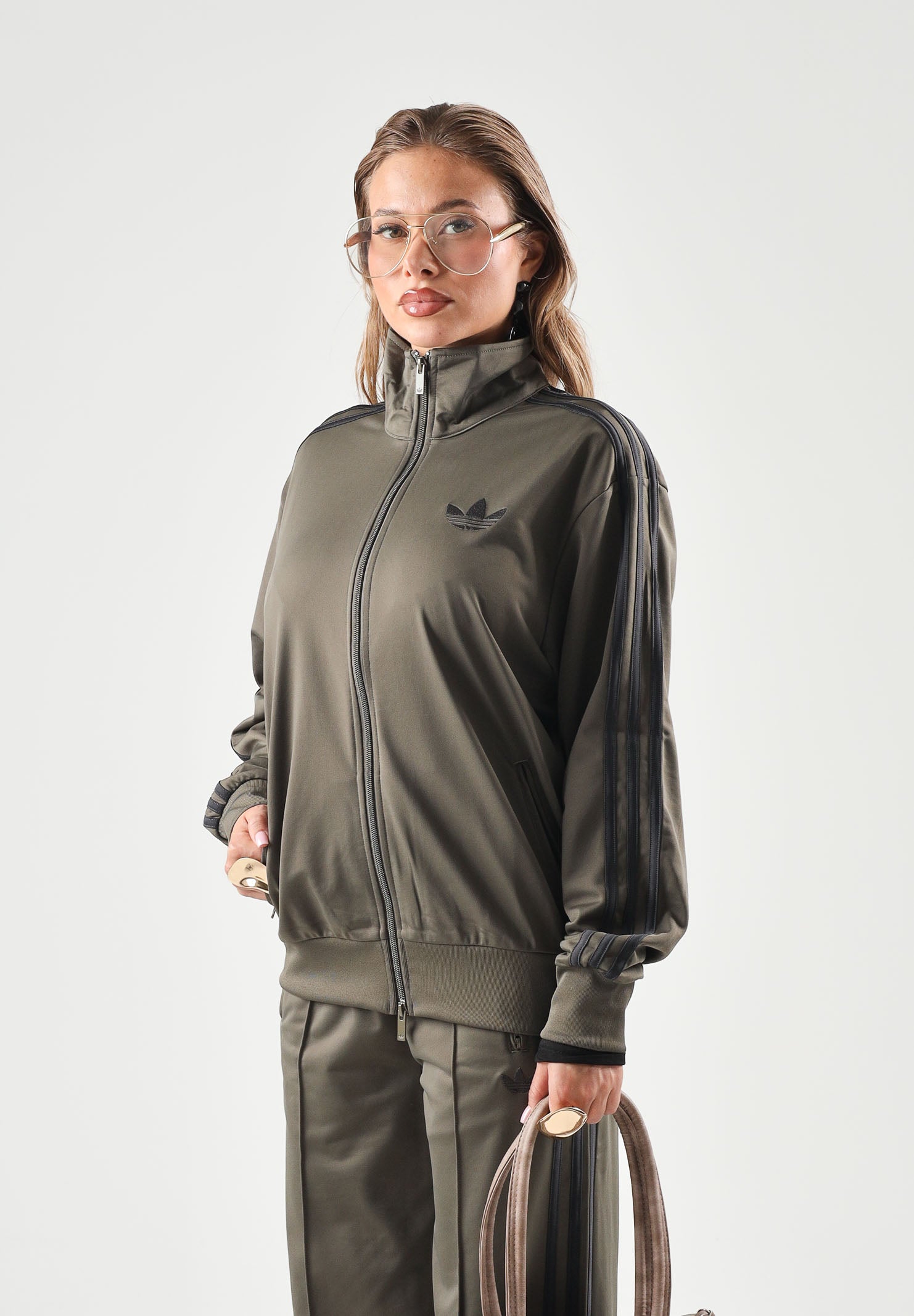 ADIDAS ORIGINALS Felpa con zip FIREBIRD  marrone scuro da donna con 3-stripes iconiche in tessuto acetato KU8198 . ADIDAS ORIGINALS 