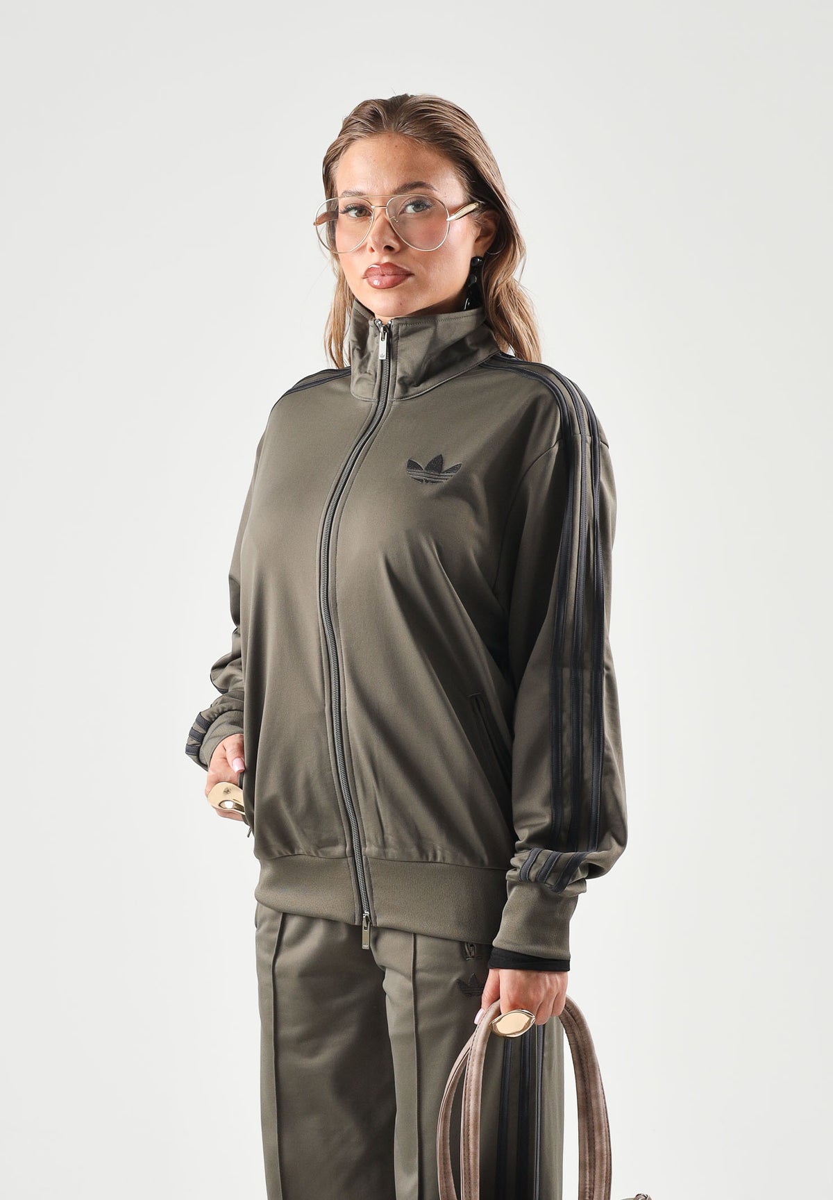 ADIDAS ORIGINALS Felpa con zip FIREBIRD  marrone scuro da donna con 3-stripes iconiche in tessuto acetato KU8198 . ADIDAS ORIGINALS 