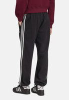 ADIDAS ORIGINALS Pantaloni ADICOLOR 3-STRIPES CUFFED nero da uomo con logo iconico KV9280 . ADIDAS ORIGINALS 