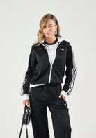 DIDAS ORIGINALS Felpa CLASSIC TRACK TOP nero da donna con iconiche 3-Stripes a contrasto KV9560 . ADIDAS ORIGINALS 