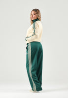 ADIDAS ORIGINALS Pantaloni FIREBIRD, warm-vaniglia, verde da donna con 3-stripes iconiche <BR/><BR/> KY0884 . ADIDAS ORIGINALS 