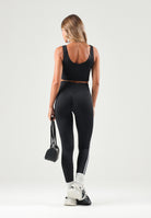 ADIDAS ORIGINALS Top sportivo ESSENTIALS 3-STRIPES SEAMLESS nero da donna KZ4109 . ADIDAS ORIGINALS 