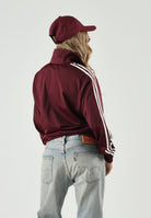 ADIDAS ORIGINALS Felpa con zip  FIREBIRD TRACK TOP maroon bordeaux da donna con logo iconico LC6500 . ADIDAS ORIGINALS 