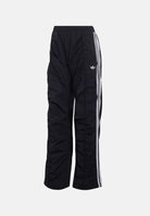 ADIDAS ORIGINALS Pantaloni ADILENIUM SEASON 6 RUFFLED Black neri da donna, in tessuto tecnico con gamba ampia, arricciature e bande laterali. LH1930 . ADIDAS ORIGINALS 