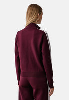 ADIDAS ORIGINALS Felpa ADILENIUM SEASON 6 KNIT TRACK TOP Maroon bordeaux da donna, in maglia tecnica con zip frontale e 3 strisce. LH1940 . ADIDAS ORIGINALS 