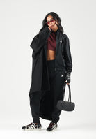 ADIDAS PERFORMANCE Tuta sportiva Essentials Feel Cozy nera da donna con finitura lucida acetata JD4475 . ADIDAS PERFORMANCE 