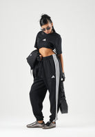 ADIDAS PERFORMANCE Pantaloni ESSENTIALS 3-STRIPES FLEECE neri  da donna JE1276 . ADIDAS PERFORMANCE 