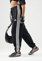 ADIDAS PERFORMANCE Pantaloni ESSENTIALS 3-STRIPES FLEECE neri  da donna JE1276 . ADIDAS PERFORMANCE 