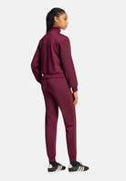 ADIDAS PERFORMANCE Tuta ESSENTIALS FEEL COZY Maroon bordeaux da  donna. KQ7582 . ADIDAS PERFORMANCE 