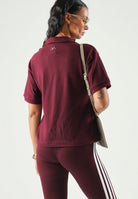 ADIDAS PERFORMANCE Polo GRAPHIC SEASONAL bordeaux da donna KV6856 . ADIDAS PERFORMANCE 