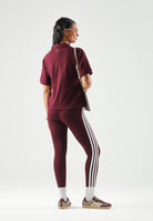 ADIDAS PERFORMANCE Polo GRAPHIC SEASONAL bordeaux da donna KV6856 . ADIDAS PERFORMANCE 