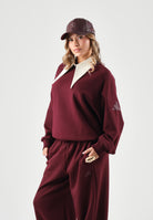 ADIDAS PERFORMANCE Felpa girocollo ESSENTIALS FLEECE SWEATSHIRT maroon bordeaux da donna. KW0922 . ADIDAS PERFORMANCE 