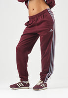 ADIDAS PERFORMANCE  Pantaloni sportivi ESSENTIALS 3-STRIPES bordeaux per uomo e donna<BR/> KY4134 . ADIDAS PERFORMANCE 