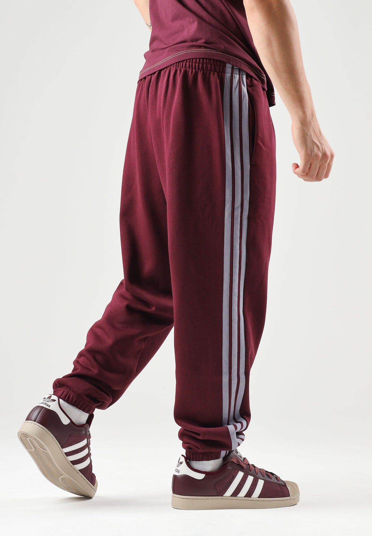 ADIDAS PERFORMANCE  Pantaloni sportivi ESSENTIALS 3-STRIPES bordeaux per uomo e donna<BR/> KY4134 . ADIDAS PERFORMANCE 