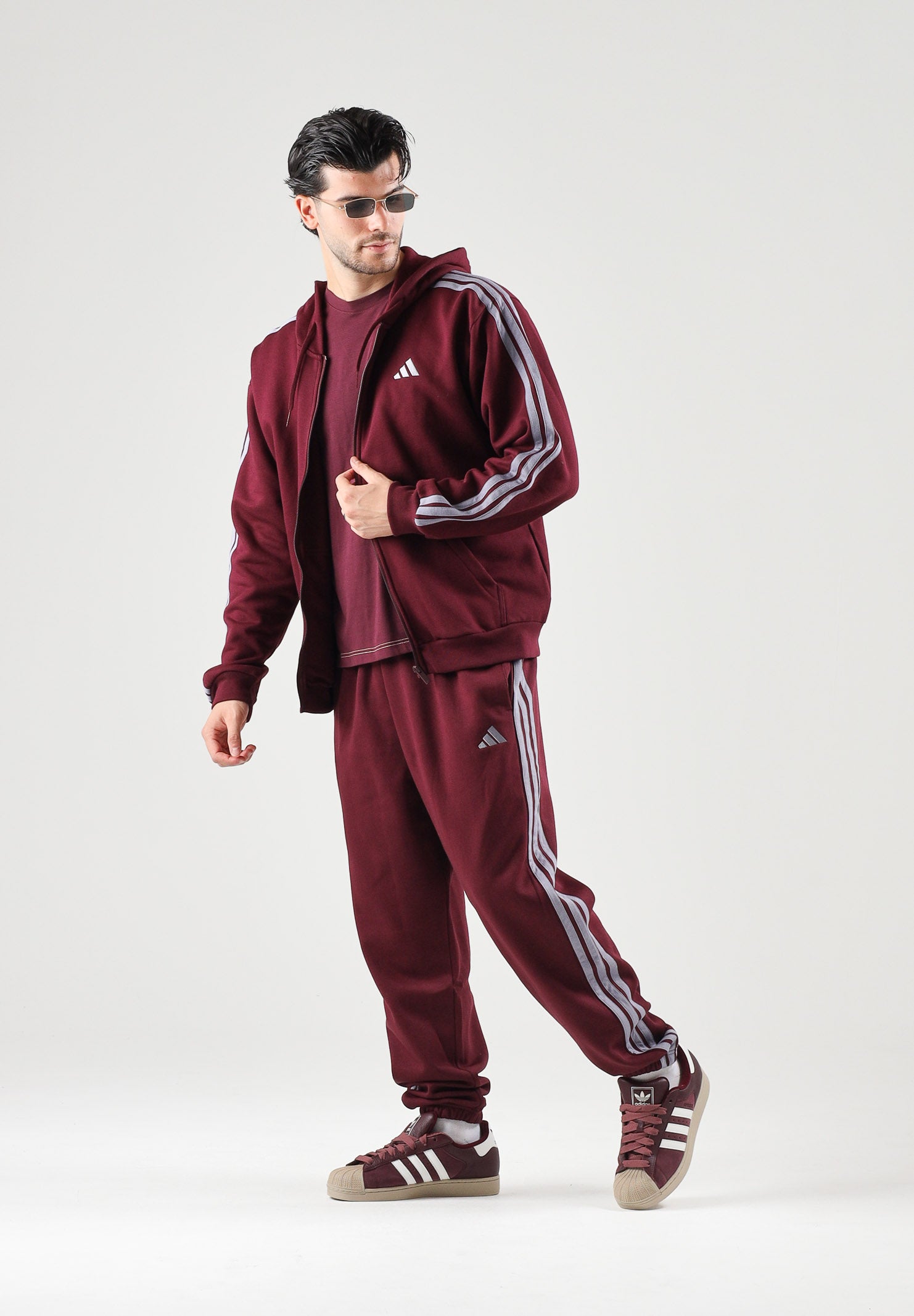 ADIDAS PERFORMANCE  Pantaloni sportivi ESSENTIALS 3-STRIPES bordeaux per uomo e donna<BR/> KY4134 . ADIDAS PERFORMANCE 