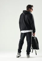 ADIDAS PERFORMANCE pantaloni sportivi Essentials 3-Stripes Fleece Tapered Cuffed Pants Black/White neri e bianchi da uomo. KY6526 . ADIDAS PERFORMANCE 