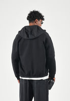 ARMANI EXCHANGE Giacca a vento nera da uomo con colletto alto protettivo e chiusura frontale con bottoni automatici. XM001011AF10818 UC001 ARMANI EXCHANGE 