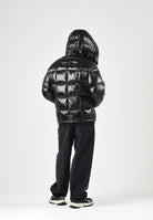 ARMANI EXCHANGE Piumino nero da uomo con cappuccio imbottito e trapuntatura a blocchi. XM003344AF23755 UC001 ARMANI EXCHANGE 