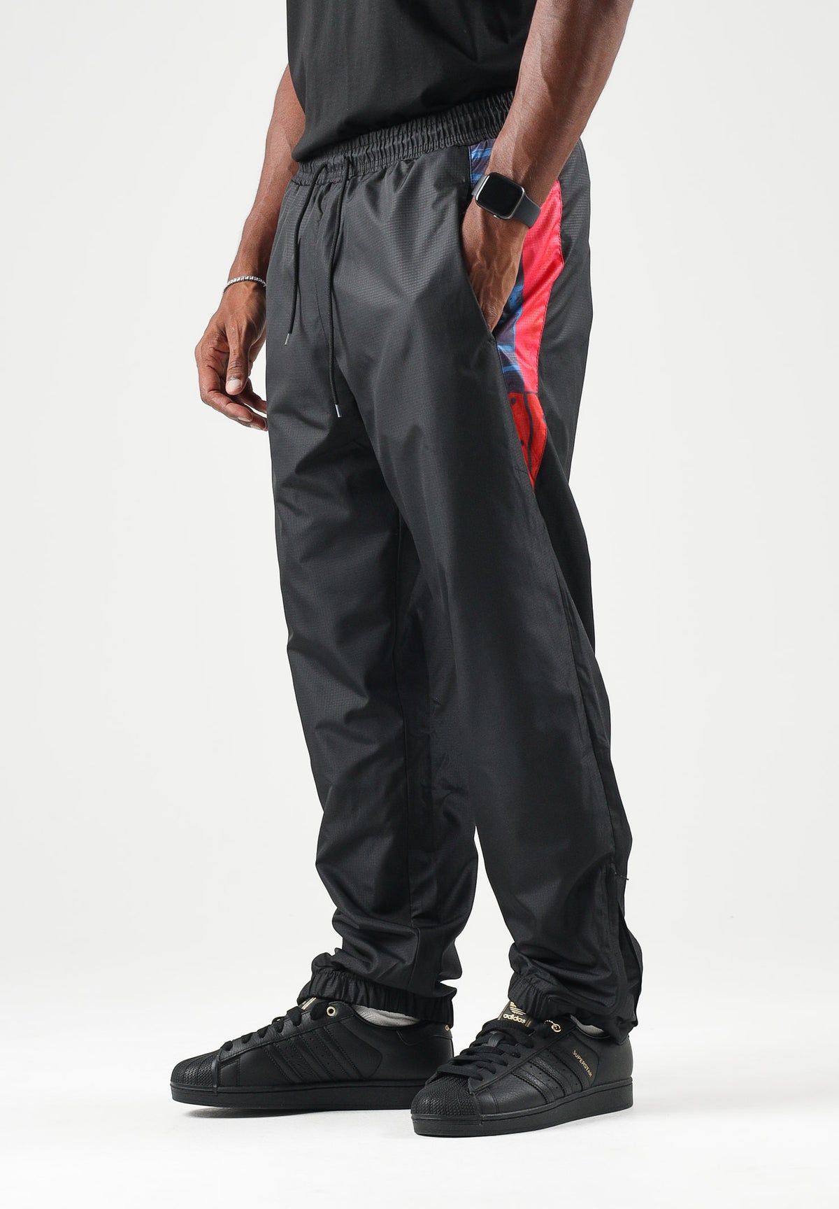 AUSTRALIAN Pantaloni sportivi TRACK PANT neri  da uomo con inserti laterali stampati ARUPA0023 003 AUSTRALIAN 