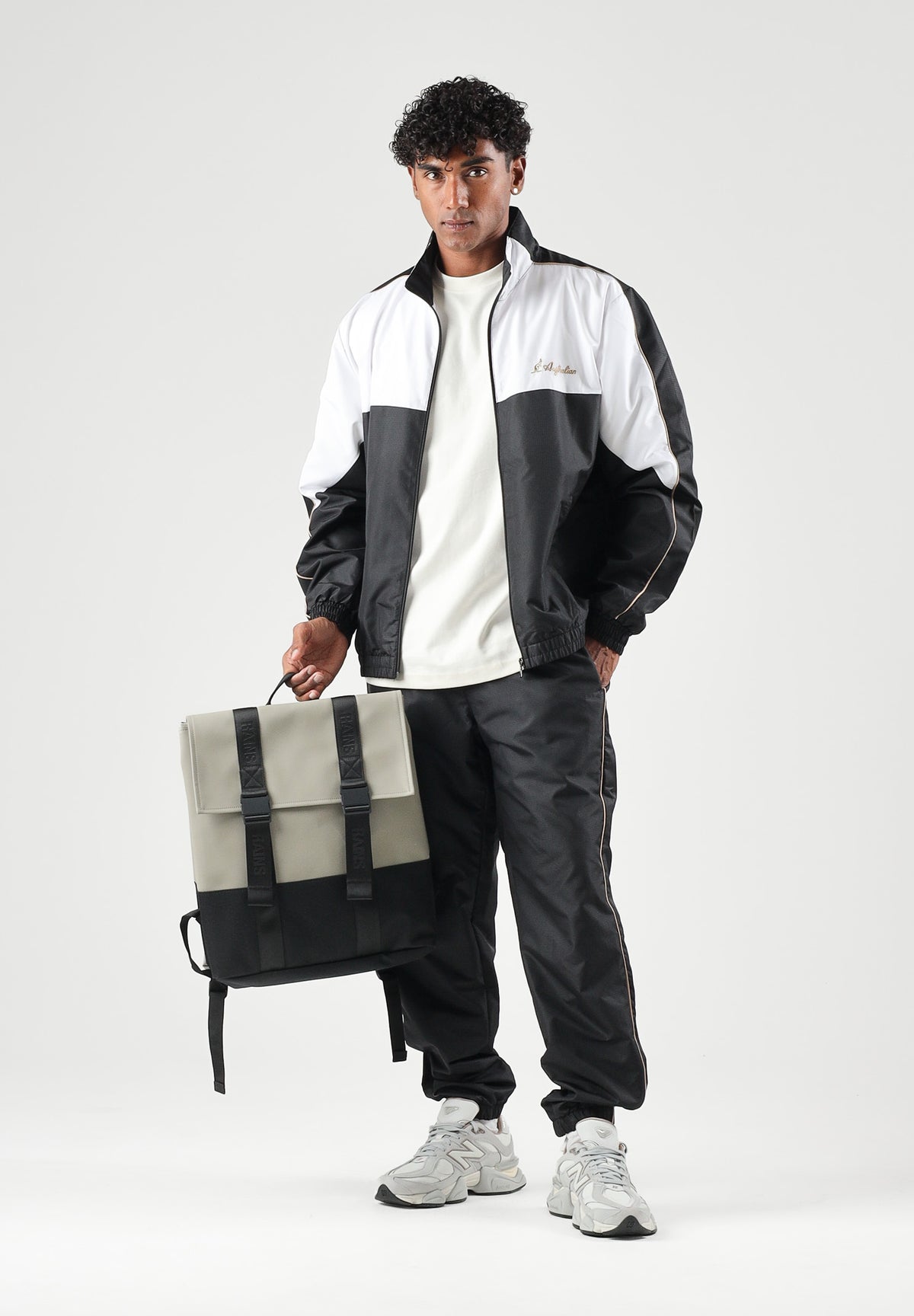 AUSTRALIAN Tuta sportiva POISON 2.0 IN BRICE SL nera per uomo con inserti bianchi a contrasto SWUTU0182 003 AUSTRALIAN 