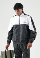 AUSTRALIAN Tuta sportiva POISON 2.0 IN BRICE SL nera per uomo con inserti bianchi a contrasto SWUTU0182 003 AUSTRALIAN 