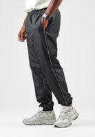 AUSTRALIAN Tuta sportiva POISON 2.0 IN BRICE SL nera per uomo con inserti bianchi a contrasto SWUTU0182 003 AUSTRALIAN 