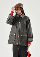 BARBOUR GiubbottoWAX  verde oliva da donna con colletto in velluto a coste 262MLWX1582 OL71 BARBOUR 