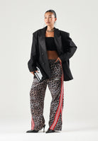 BARROW Pantaloni marrone per uomo e donna con stampa animalier leopardo e bande laterali a contrasto F6BWUAPA089 220 BARROW 