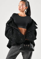 CALVIN KLEIN Brassiére- nero per donna con fascia elastica logata. LV00QF9078 UB1 CALVIN KLEIN 