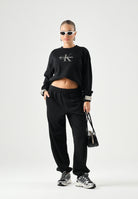 CALVIN KLEIN Fellpa girocollo LS MONOLOGO FRENCH TERRY nera da donna con maxi monogramma CK sul davanti LV047B234G UB1 CALVIN KLEIN 