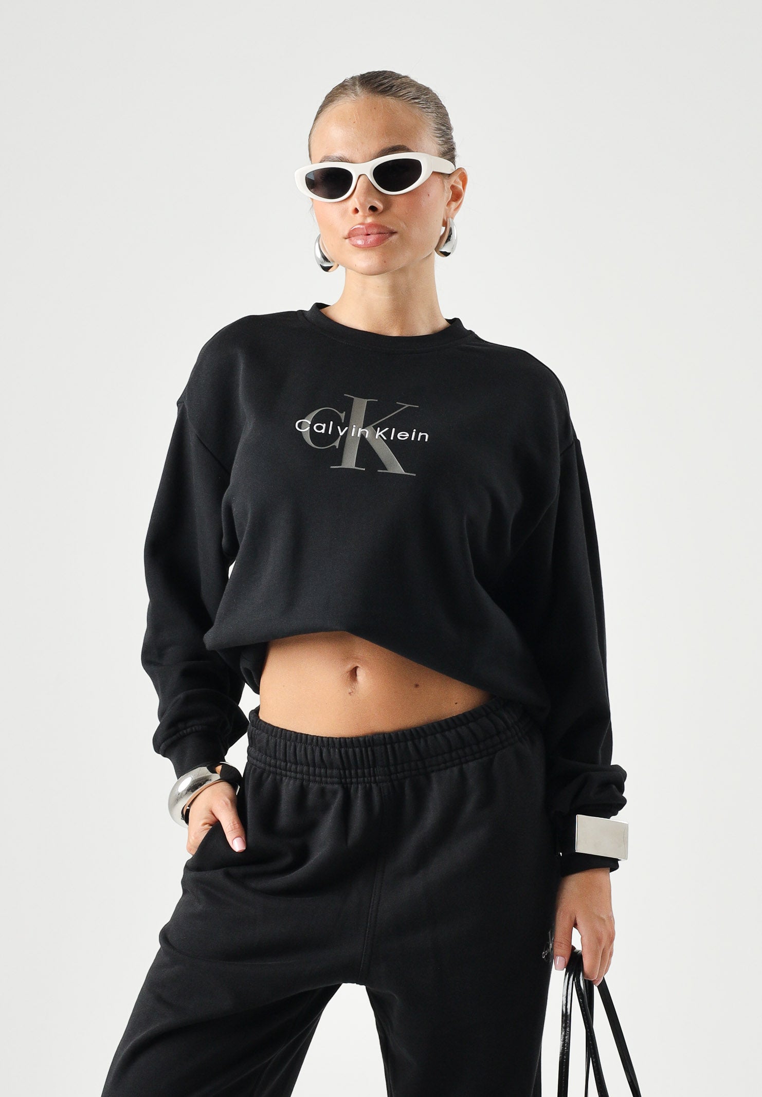 CALVIN KLEIN Fellpa girocollo LS MONOLOGO FRENCH TERRY nera da donna con maxi monogramma CK sul davanti LV047B234G UB1 CALVIN KLEIN 