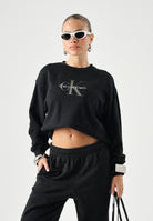 CALVIN KLEIN Fellpa girocollo LS MONOLOGO FRENCH TERRY nera da donna con maxi monogramma CK sul davanti LV047B234G UB1 CALVIN KLEIN 