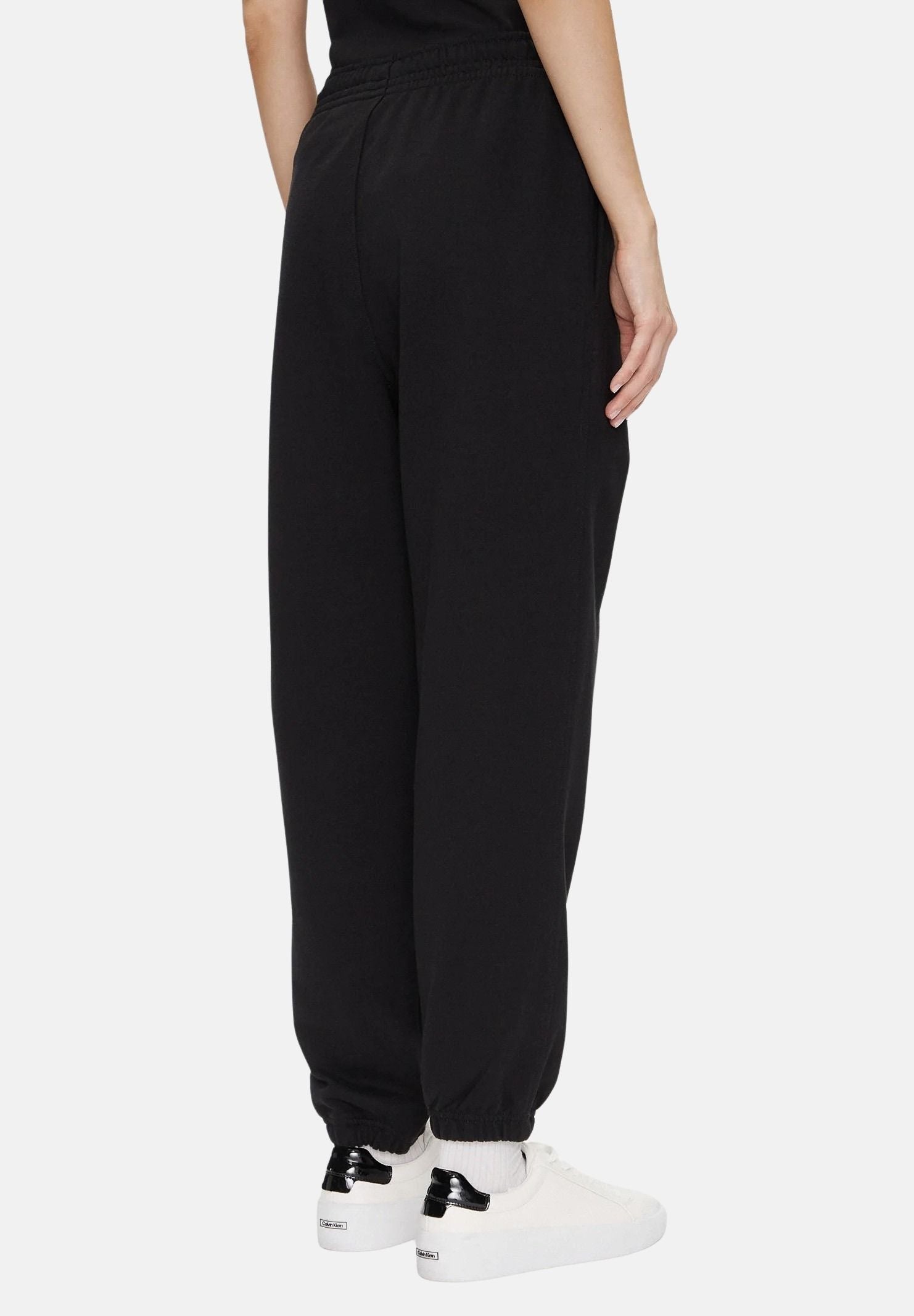 CALVIN KLEIN Pantaloni MONOLOGO FRENCH TERRY jogger nero da donna con logo CK laterale tono su tono<BR/> LV047B235G UB1 CALVIN KLEIN 