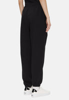 CALVIN KLEIN Pantaloni MONOLOGO FRENCH TERRY jogger nero da donna con logo CK laterale tono su tono<BR/> LV047B235G UB1 CALVIN KLEIN 