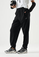 CALVIN KLEIN Pantaloni MONOLOGO FRENCH TERRY jogger nero da donna con logo CK laterale tono su tono<BR/> LV047B235G UB1 CALVIN KLEIN 