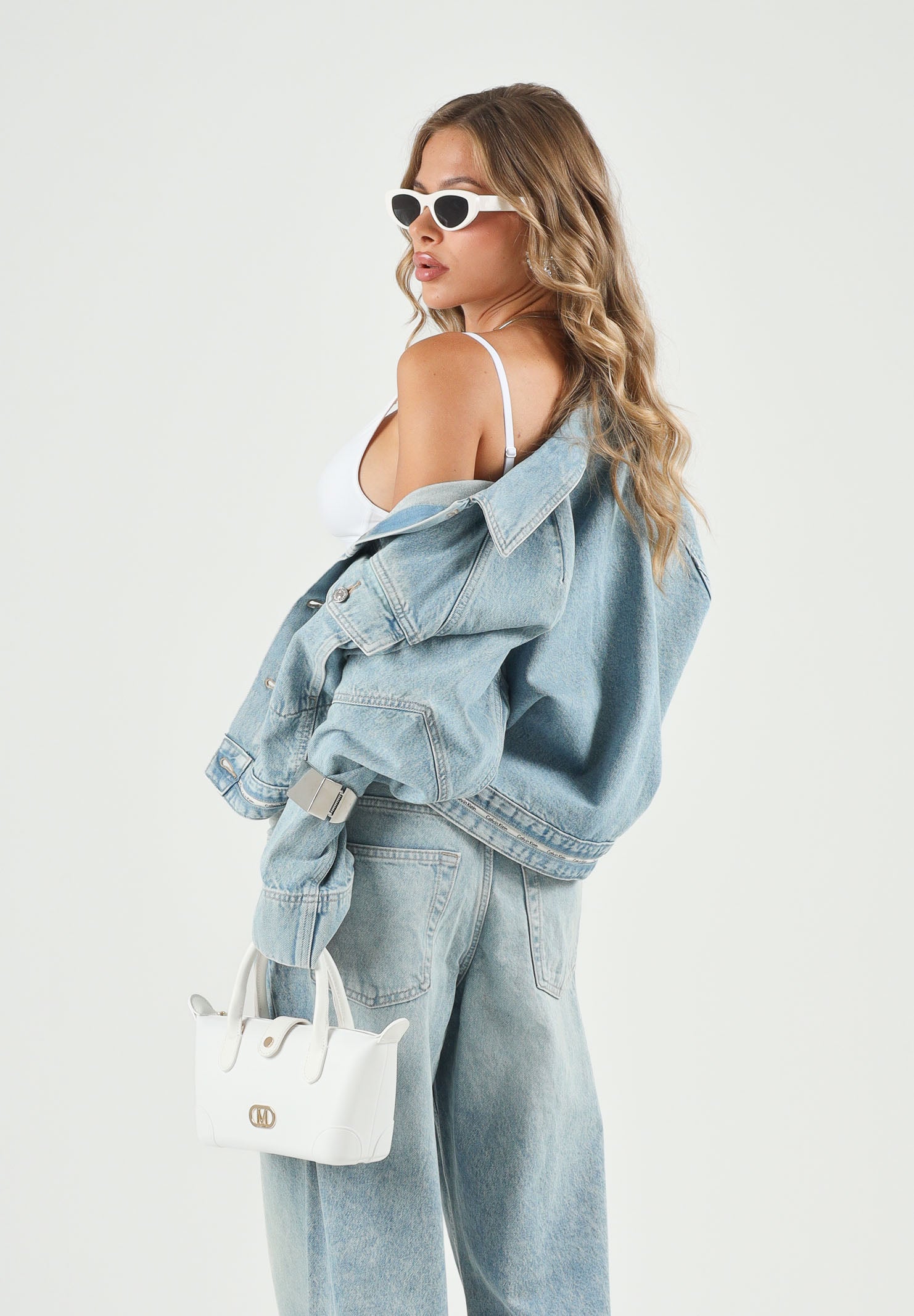 CALVIN KLEIN JEANS Giacca BOXY di jeans, tape denim azzurro chiaro da donna con nastro logato Calvin Klein.<BR/> LV047G726G YP3 CALVIN KLEIN JEANS 