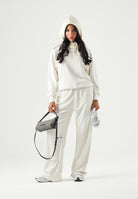 CALVIN KLEIN JEANS Pantaloni sportivi Logo Embroidered Sweatpants tofu avorio, colore basico bianco, donna. LV047G822G YAS CALVIN KLEIN JEANS 