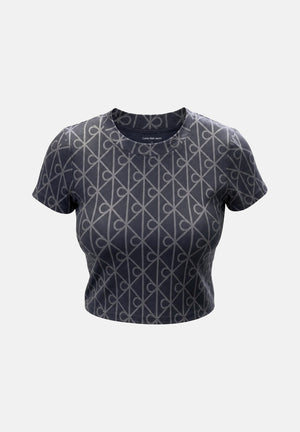 CALVIN KLEIN JEANS T-shirt EMBLEM PRINT, ebony nero da donna con motivo monogramma CK all-over.<BR/> LV047G830G 4XN CALVIN KLEIN JEANS 