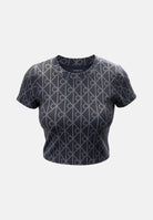 CALVIN KLEIN JEANS T-shirt EMBLEM PRINT, ebony nero da donna con motivo monogramma CK all-over.<BR/> LV047G830G 4XN CALVIN KLEIN JEANS 