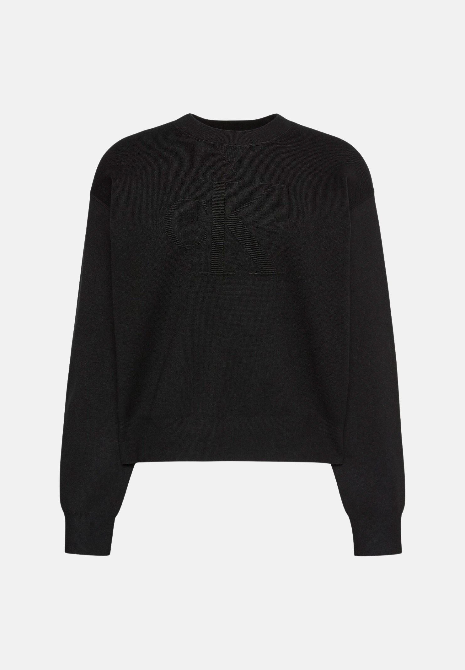 CALVIN KLEIN JEANS Maglia girocollo LOGO OTTOMAN LS PULL Black nera da donna, con maxi logo CK in rilievo tono su tono sul petto, maniche lunghe, spalle scese e bordi rifiniti a costine. LV047H315G UB1 CALVIN KLEIN JEANS 