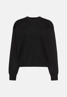 CALVIN KLEIN JEANS Maglia girocollo LOGO OTTOMAN LS PULL Black nera da donna, con maxi logo CK in rilievo tono su tono sul petto, maniche lunghe, spalle scese e bordi rifiniti a costine. LV047H315G UB1 CALVIN KLEIN JEANS 