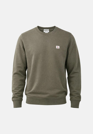 CALVIN KLEIN JEANS Felpa girocollo Dusty Olive, verde oliva, da uomo con patch logo e motivo in tinta unita. LV04RG268G LDY CALVIN KLEIN JEANS 