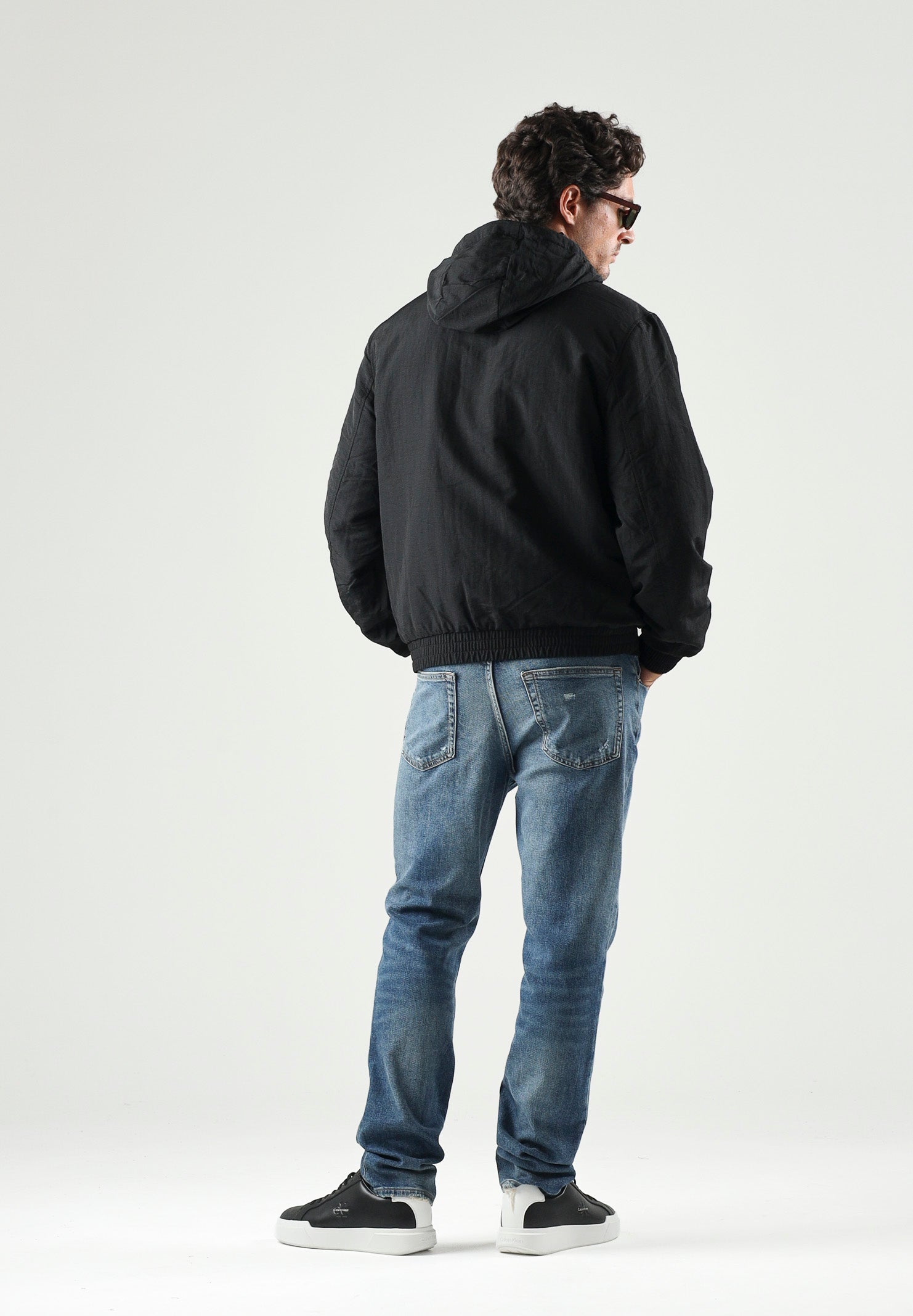 CALVIN KLEIN JEANS Giubbotto con cappuccio nero da uomo con logo iconico LV04RG501G UB1 CALVIN KLEIN JEANS 