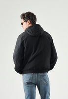 CALVIN KLEIN JEANS Giubbotto con cappuccio nero da uomo con logo iconico LV04RG501G UB1 CALVIN KLEIN JEANS 