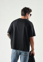 CALVIN KLEIN JEANS T-shirt MONOGRAM nera da uomo con logo centrale LV04RG814G UB1 CALVIN KLEIN JEANS 