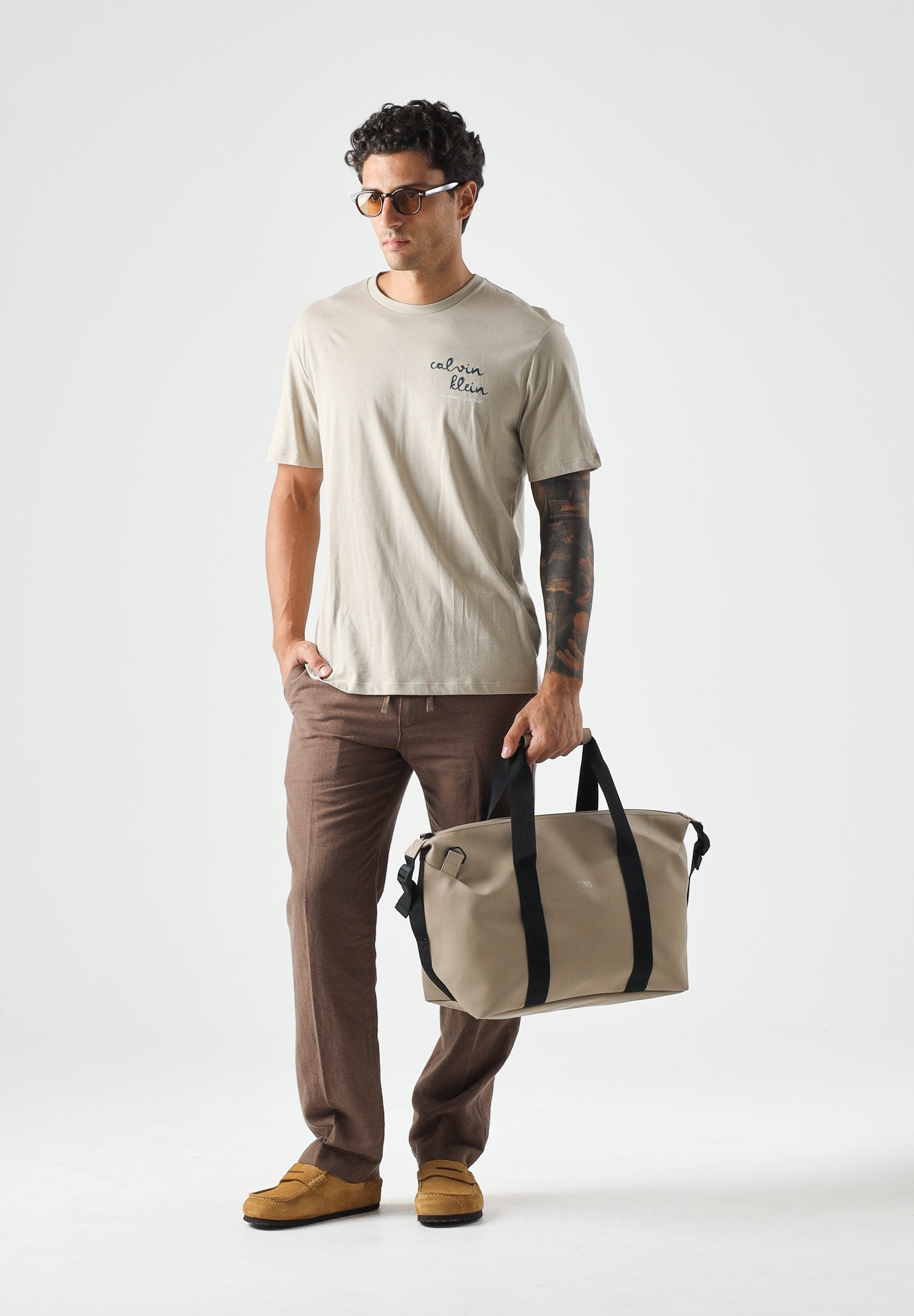 CALVIN KLEIN JEANS T-shirt  TRVL LINES SEASONAL TEE  beige da uomo LV04RG837G PED CALVIN KLEIN JEANS 