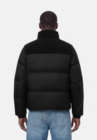 CALVIN KLEIN JEANS Piumino NYLON CORDUROY DOWN PUFFER JACKET Black nero da uomo, inserti in velluto a coste su collo e spalle, chiusura con zip e logo ricamato sul petto.<BR/> LV04RH503G UB1 CALVIN KLEIN JEANS 