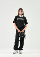 DIESEL T-shirt TJEANS OVER nera per donna, ragazzi e bambini con logo Diesel frontale effetto sfrangiato J02992KYA1Y K900 DIESEL 